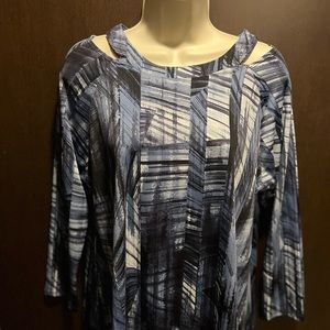 Stunning peekaboo shoulder blouse!